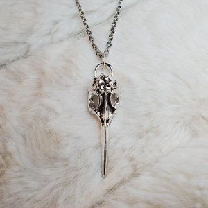 Bird skull plague doctor charm necklace.